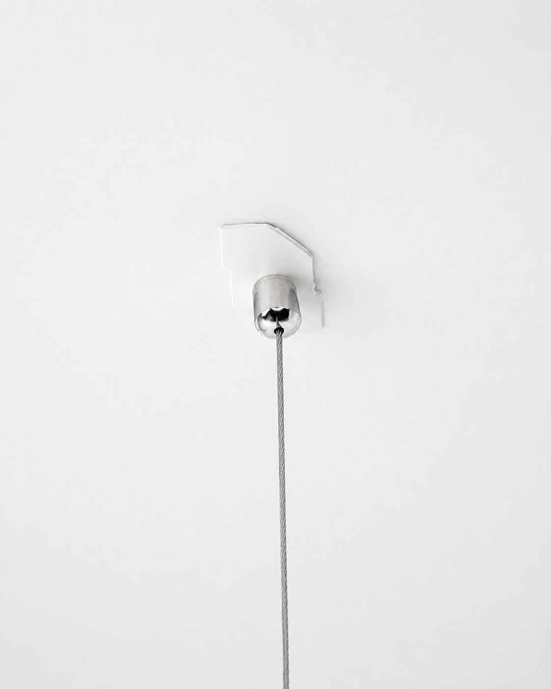 Modern pendant light fixture on a white background