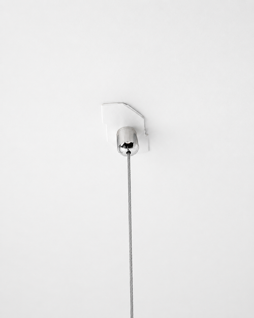 Modern pendant light fixture on a white background